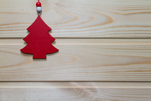 istock Christmas wooden background decorated with a toy. 499451932