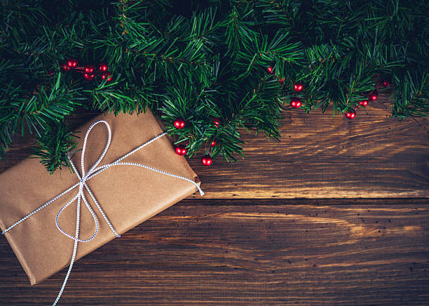 Rustic Christmas gift with evergreen garland