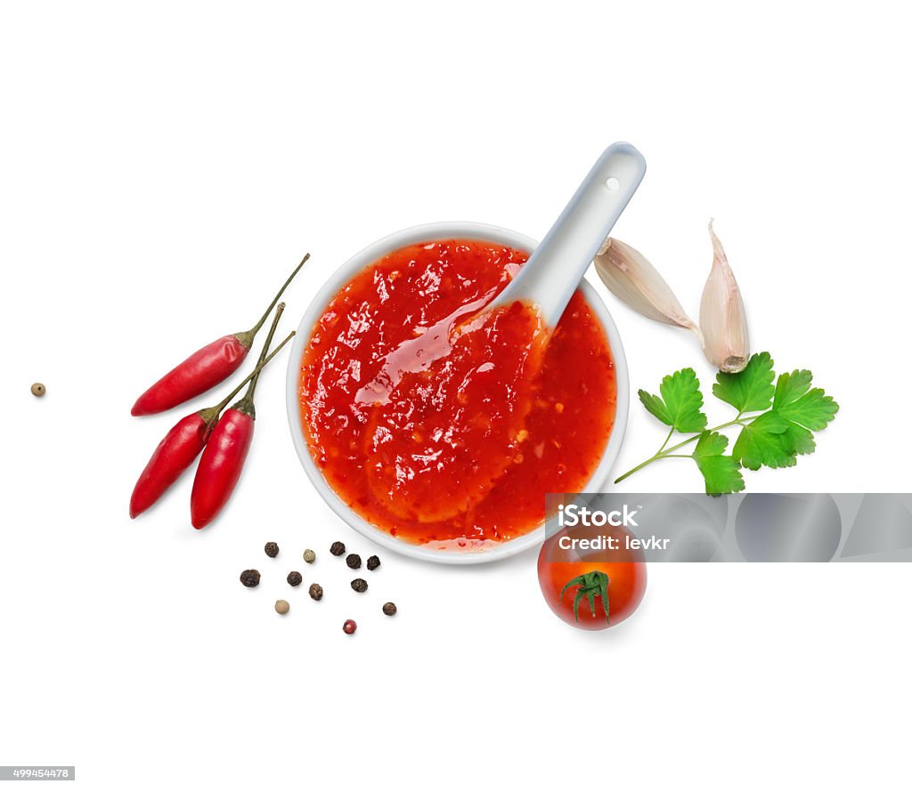 red hot chilli sauce red hot chilli sauce  isolated on a white background.Top view Chili Pepper Stock Photo