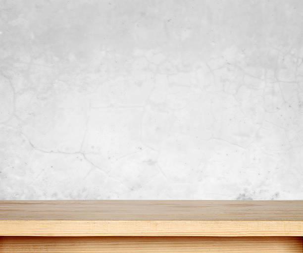 Wooden table Wooden table on wall background. restaurant table layout stock pictures, royalty-free photos & images