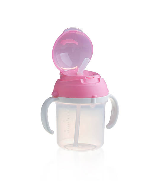 istock baby bottle, cup with handles 499458170