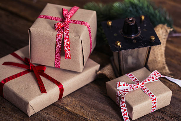 istock Christmas presents on a wooden background with candy 499458530