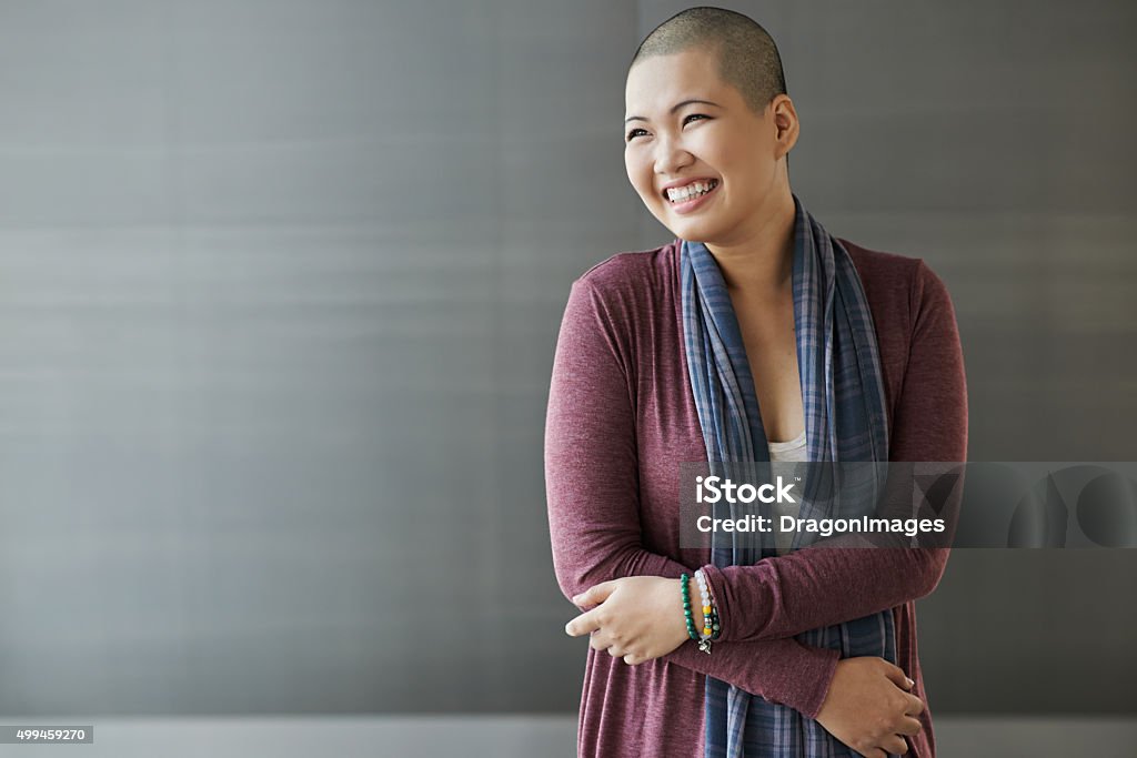 Breast cancer survivor Portrait of happy Vietnamese breast cancer survivor Cancer - Illness Stock Photo