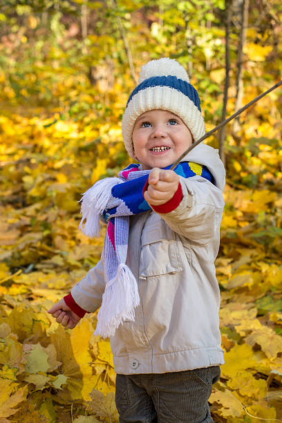 istock Little boy with beautiful eyes looking up 499460642
