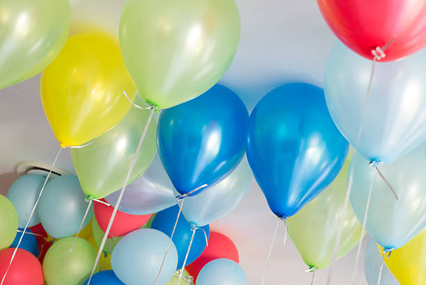 istock Balloons floating on roof celling. 499461598