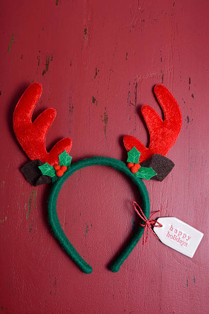 istock Christmas Reindeer Ears on wood background. 499462550