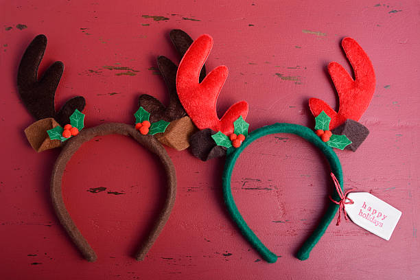 istock Christmas Reindeer Ears on wood background. 499462824