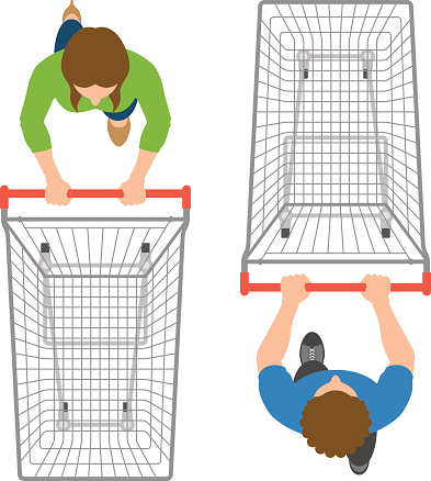 Overhead view of man and woman pushing empty trolleys