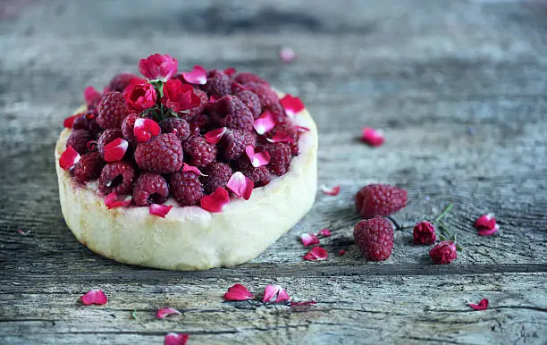 Photo of Raspberry deep-dish pie with rose petals