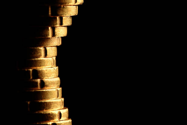 istock Euro coins on black background 499466981