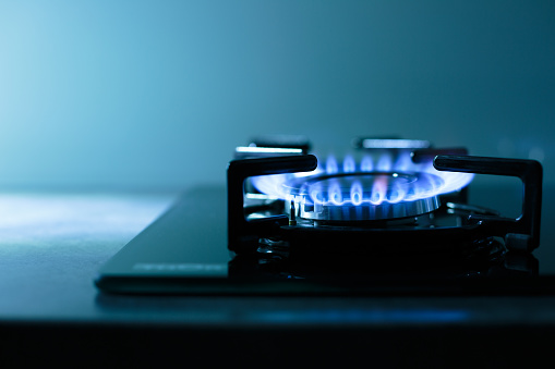 Ffames of dark gas stove/cooker (shallow DOF)