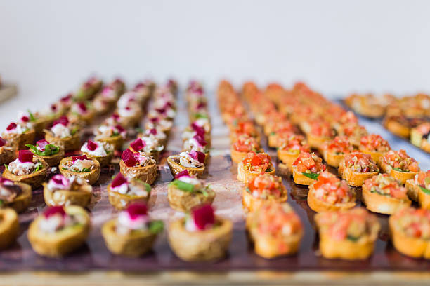 Selection of canapes Selection of delicious canapes placed on a tray canape stock pictures, royalty-free photos & images