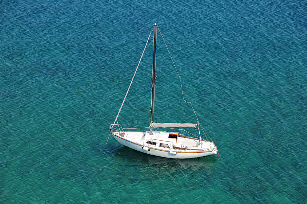 istock Boat in a quiet bay on Adriatic sea 499469133