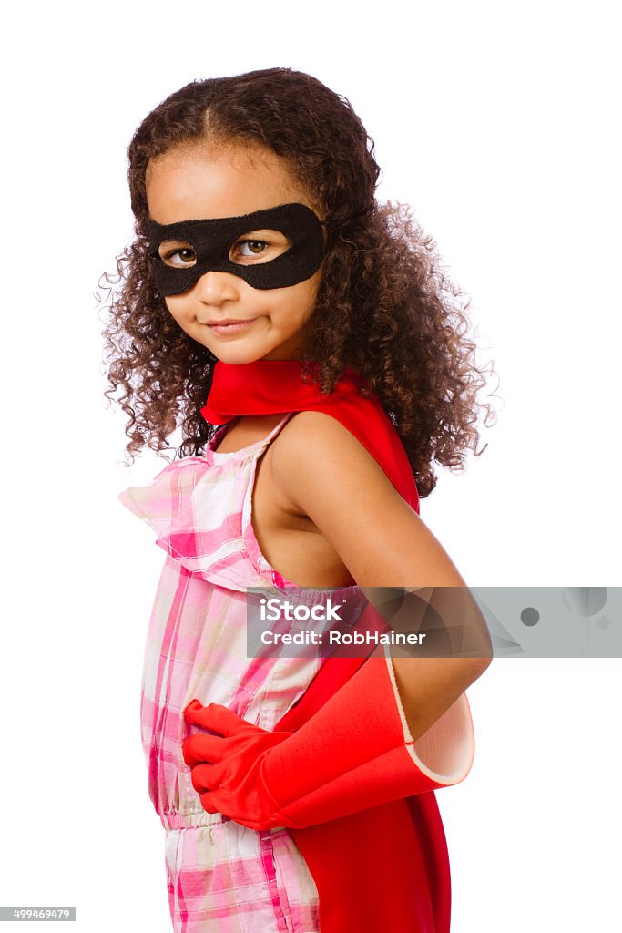 Mixed race girl pretending to be a super hero Portrait of pretty mixed race African American girl pretending to be a super hero Superhero Stock Photo