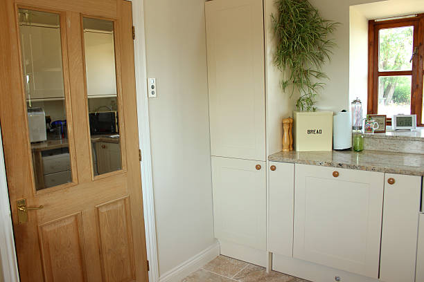 Image of country kitchen, Shaker cabinets, cream doors, pine door