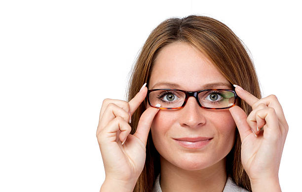 istock Woman testing glasses head shot isolated 499470559