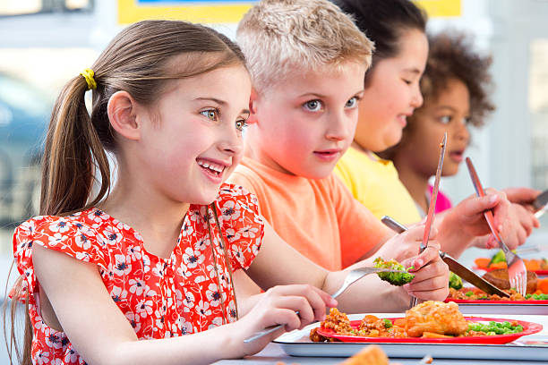 istock Children Eating School Dinners 499470905