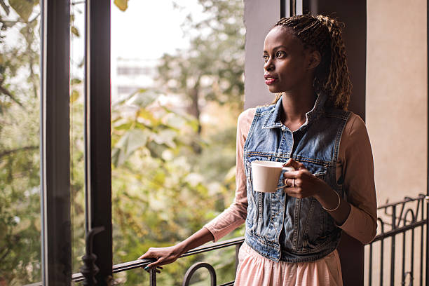 istock Pensive African American woman with a coffee cup. 499478848
