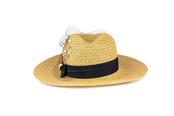 istock Pretty straw hat with flower isolated on white 499479412
