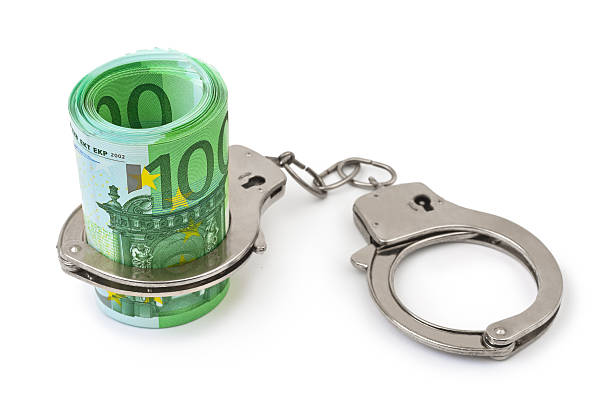 istock Money and handcuffs 499479788