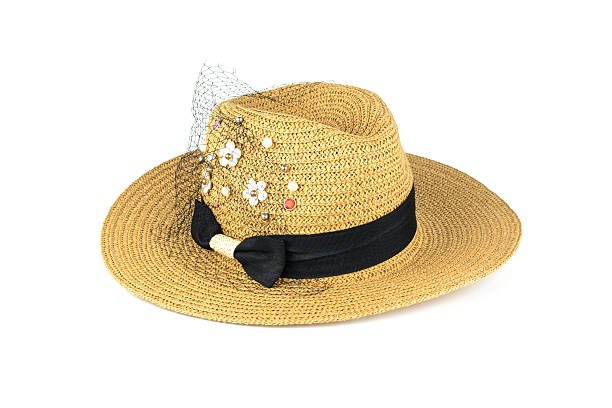 istock Pretty straw hat with flower isolated on white 499480210