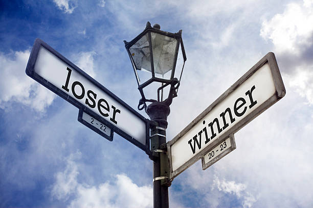 istock Loser vs Winner Writen on Street Sign 499480946