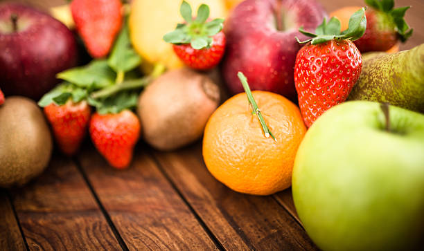 istock bunch of tropical fruit on the table 499481130
