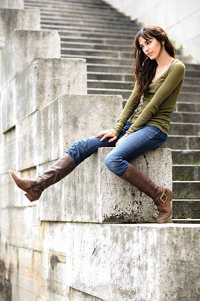 istock Young Woman relaxing along Seine 499481920