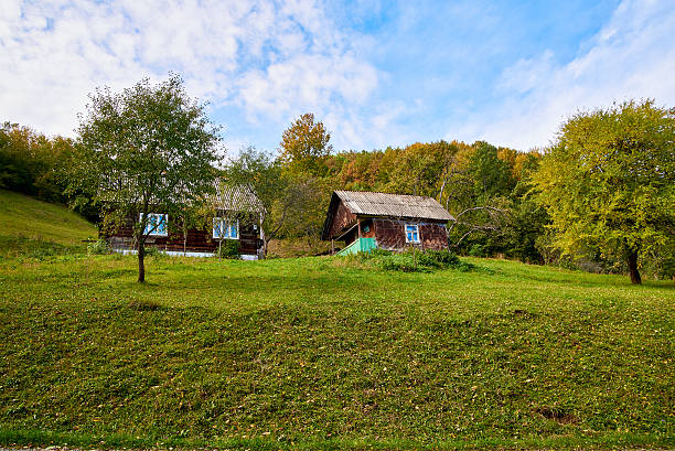 istock Mountain country village landscape with clouds and blue sky 499483452