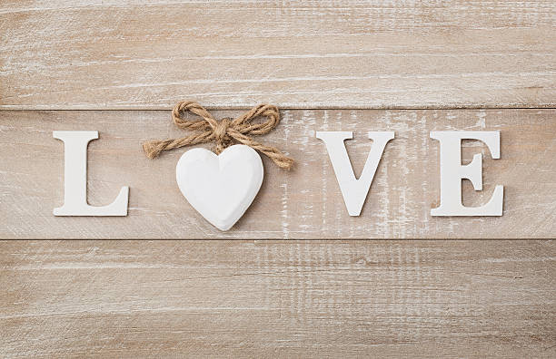 istock Love wooden text on vintage board background with copy space 499487026