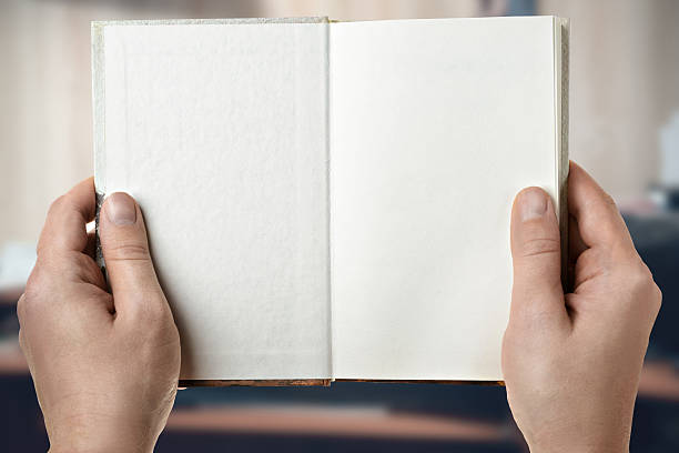 istock The book is in the hands of man 499489514