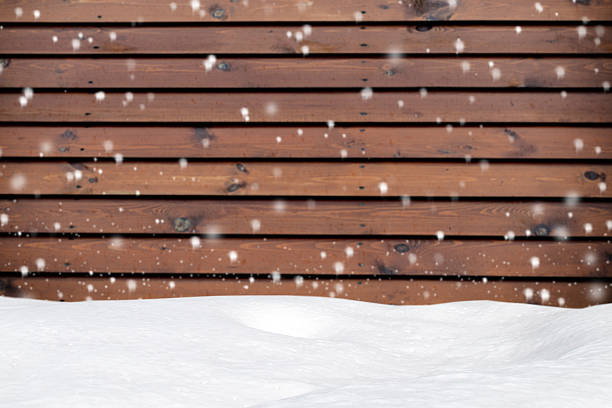 istock Blurred wood texture with snow christmas background 499490944