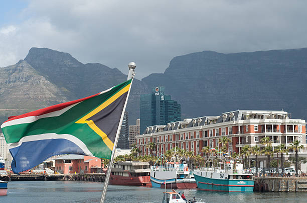 South African Flag Cape Town South African Flag Cape Town  south africa flag stock pictures, royalty-free photos & images