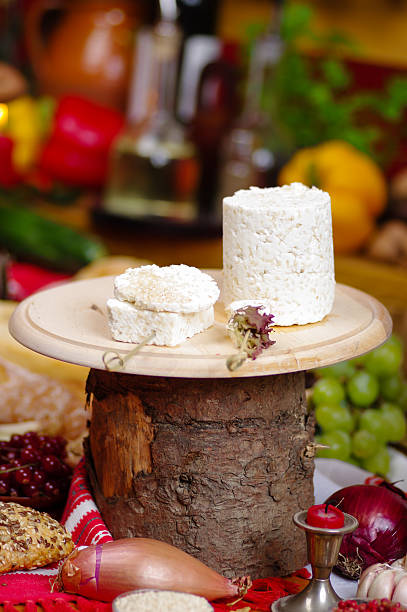 istock pieces of cheese on a knife board  rustic background 499511694