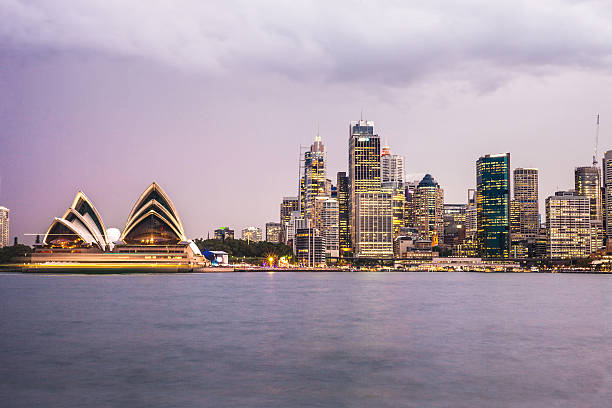 istock Sydney CBD and harbor illuminated at dusk 499511948