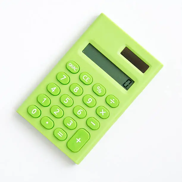 Photo of green cute calculator on white background