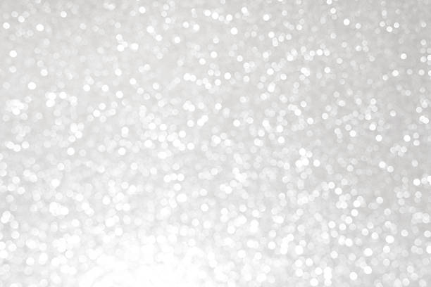 istock Silver glittering christmas lights. Blurred abstract background 499512542