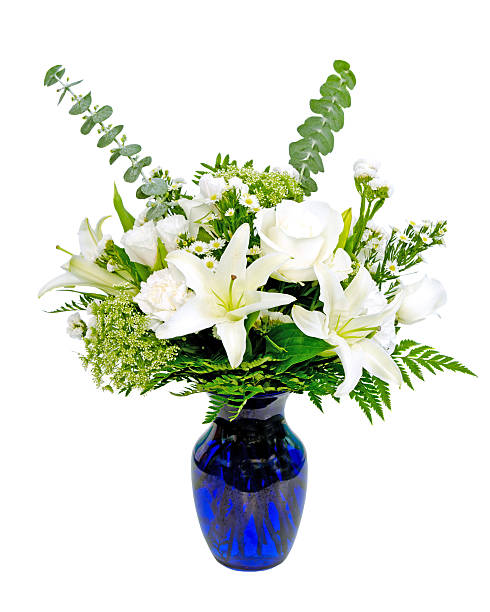 istock Flower arrangement in vase isolated on white 499514875