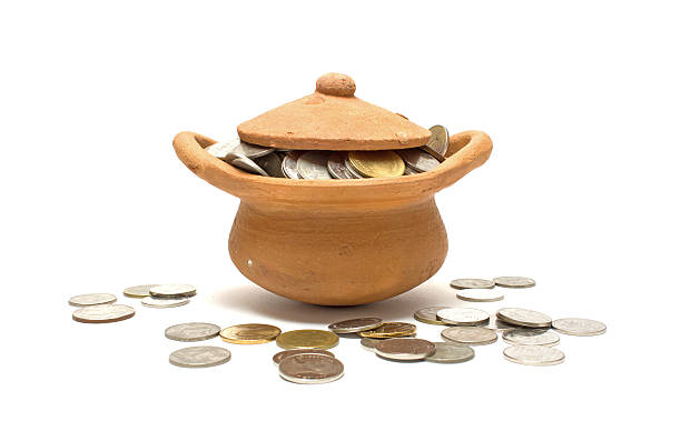 istock Baht coins clay pot 499516630