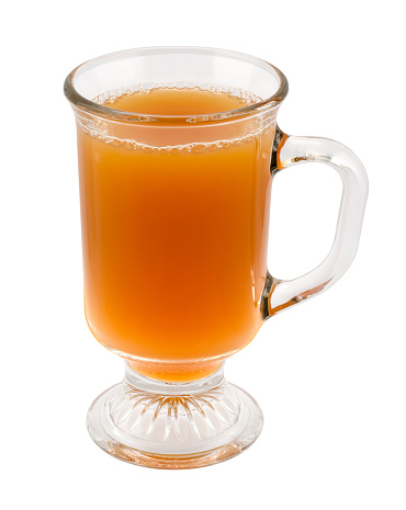 Apple Cider in a Glass Mug. The image is a cut out, isolated on a white background, with a clipping path. Traditionally served around the holidays.