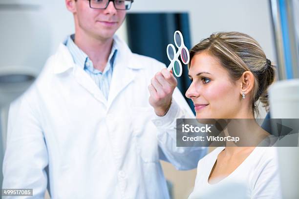 Pretty Young Woman Having Her Eyes Examined By Optometrics Stock Photo - Download Image Now