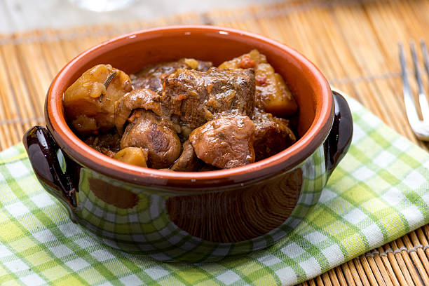 istock stew with potatoes in a terracotta bowl 499517557