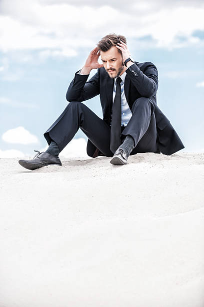istock Depressed and confused businessman. 499517947