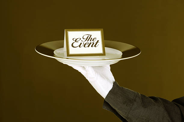 istock The Event Card On Platter Held By Waiter 499518767
