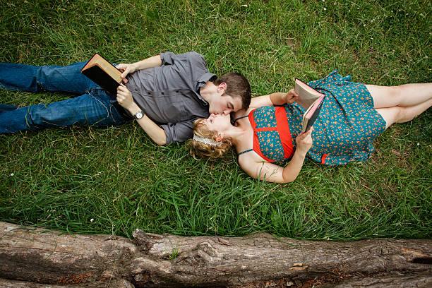 istock Cute Book Worm Couple Kissing 499519729