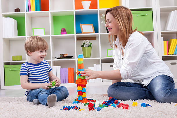 istock Happy family playing with toys 499520005