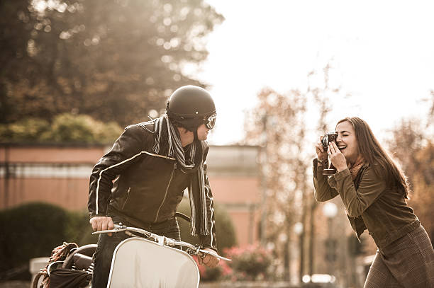 istock Vintage Couple with Scooter in Italy 499520718