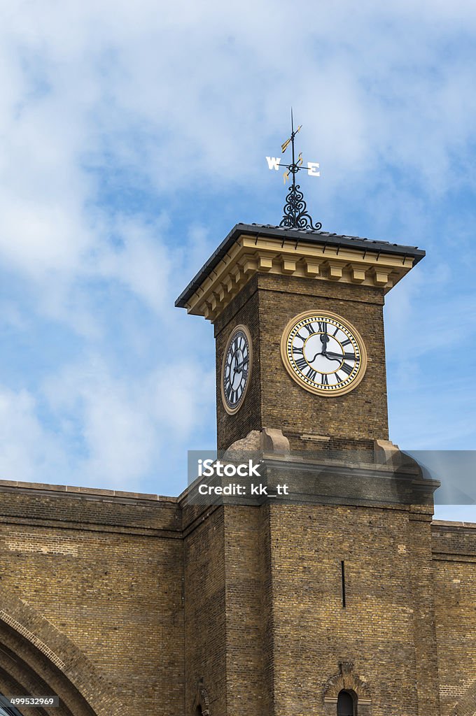 London King's Cross station clock, England, UK Arrow - Bow and Arrow Stock Photo