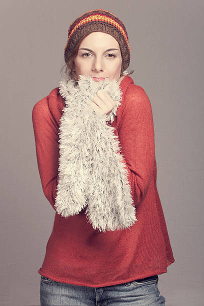 istock Attractive smiling woman in winter clothes 499533877