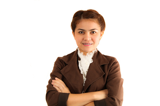 friendly asian business woman over a white background